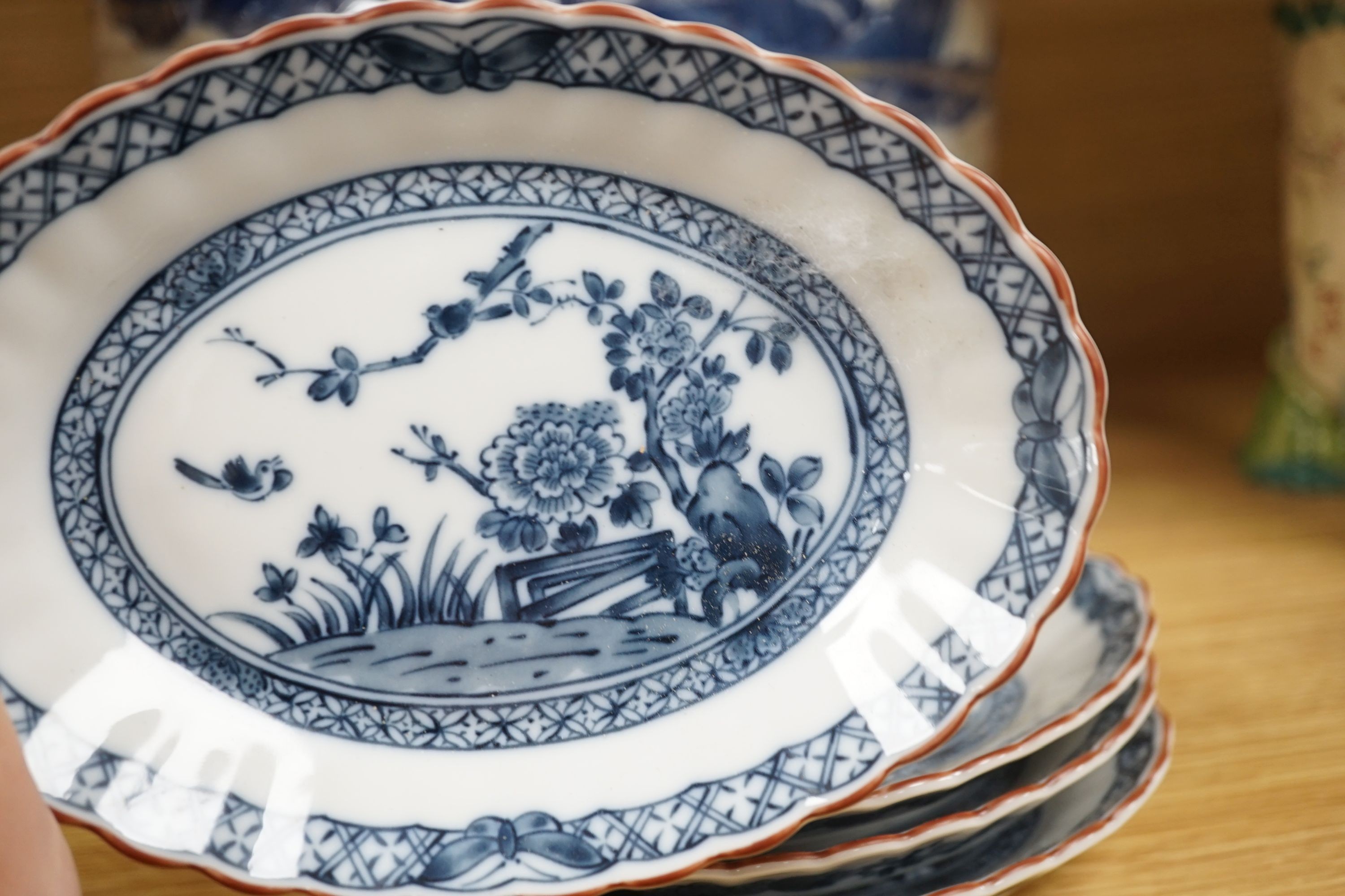 A damaged Chinese blue and white jardiniere and four small dishes, jardiniere 22cms high.